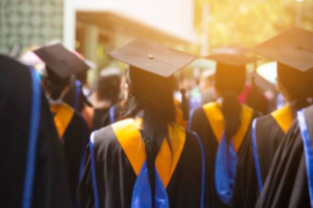 istock Group of Graduates during commencement. Concept education congratulation in University. Graduation Ceremony in University during commencement. close up hat. 952332352