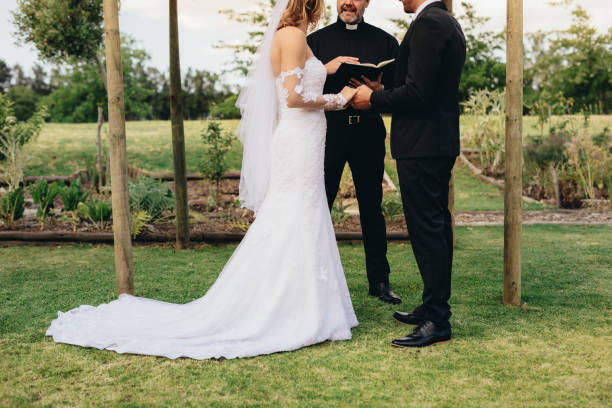 istock Couple getting married at an outdoor wedding ceremony 952333440