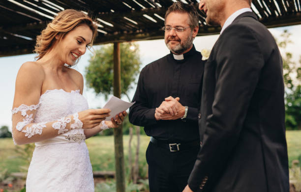 istock Woman read wedding vows for her husband 952334360