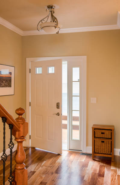 istock Front door and hall with wooden floor 952343450