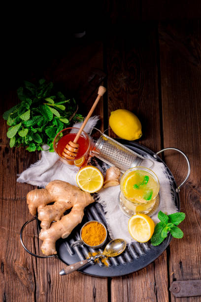 istock ginger lemonade with honey and lemons 952344144
