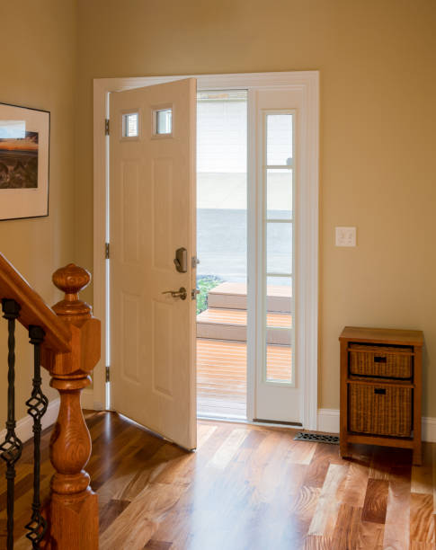 istock Front door and hall with wooden floor 952344440