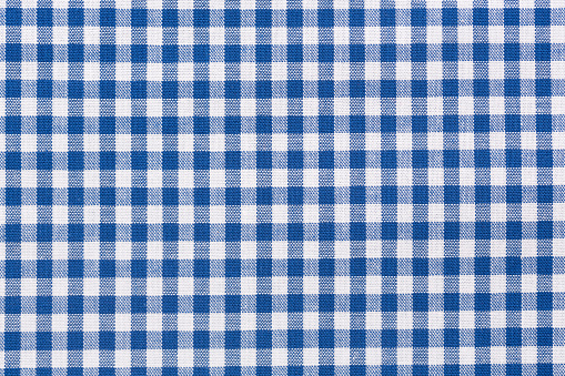 Background of blue and white checkered tablecloth.