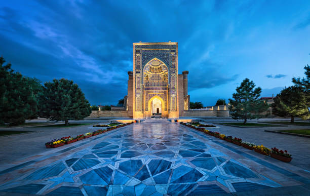 Entrance portal to Gur-e-Amir mausoleum in Samarkand, Uzbekistan Entrance portal to Gur-e-Amir - a mausoleum of the Asian conqueror Timur (also known as Tamerlane) in Samarkand, Uzbekistan uzbekistan stock pictures, royalty-free photos & images
