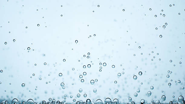 istock Small bubbles of oxygen on blurred blue background - liquid oxygen 95235199