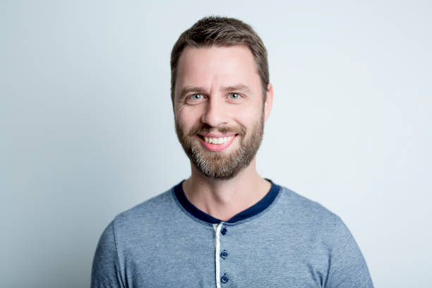 istock Portrait of a smiling man 952357420