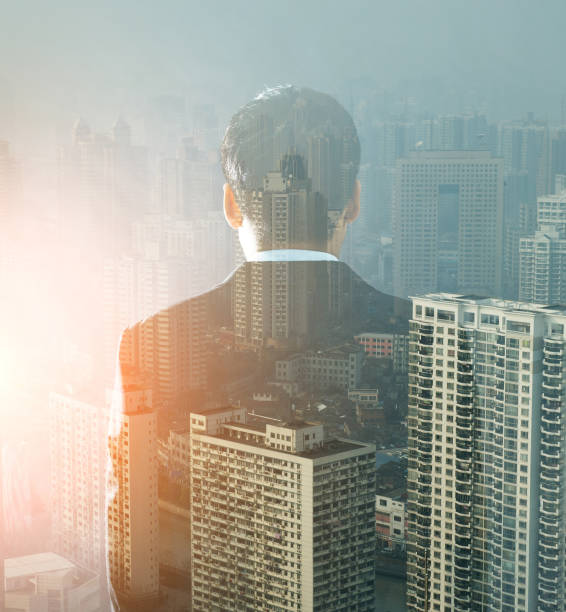 istock Multiple exposure of businessman's back 952360334