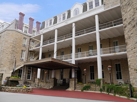 EUREKA SPRINGS, ARKANSAS—May 2017:  Front view of the Crescent Hotel & Spa in Eureka Springs, Arkansas. Built in 1886, the Crescent Hotel is known as America’s most haunted hotel.
