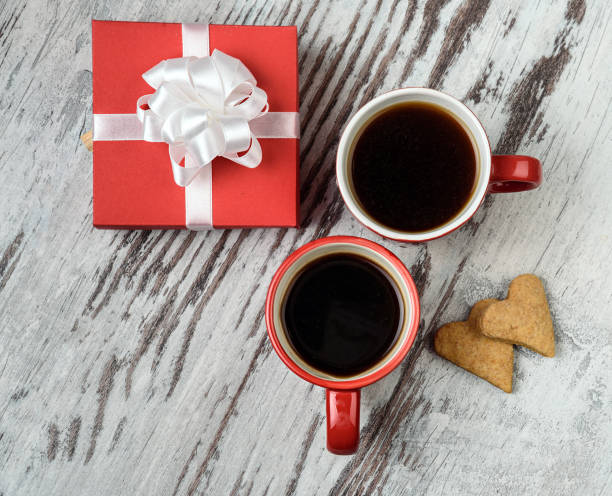 istock red coffee cup, hearts cokies and gift box. 952361282