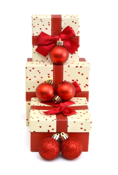 istock Red Gift boxes and red christmas balls,Isolated on white. 952366718
