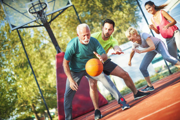 basketball game with family. - vacations two generation family caucasian friendship imagens e fotografias de stock