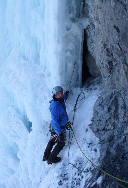 istock ice climbing in the Swiss Alps 952370286