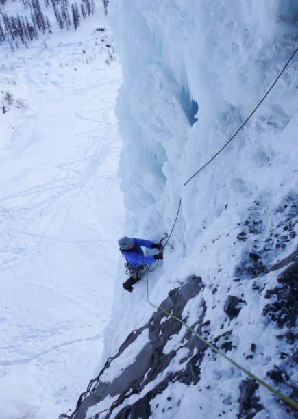 istock ice climbing in the Swiss Alps 952370350