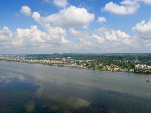 istock Aerial waterfront view reflected in the water seen from an airplane window 952378524