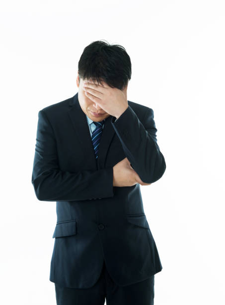 istock Businessman putting hand on forehead 952378534