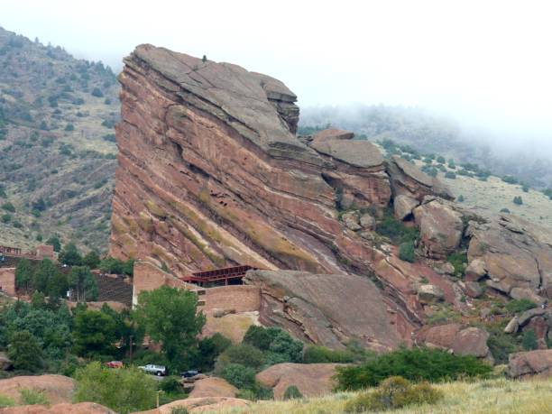 Huge boulders of natural rock formation Red Rocks Ampitheater in Morrison. The ampitheater is a favorite venue for concerts and other events. morrison stock pictures, royalty-free photos & images