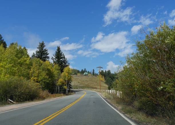istock Scenic view with winding road on a beautiful sunny day 952379702