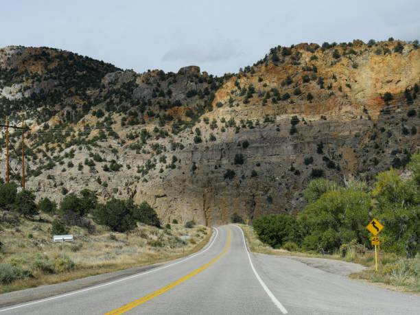 istock Paved highways winding up and around rugged mountain terrains and passes 952384450