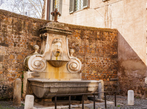 istock Fountain in Via Giulia, known as mascherone in Rome 952389806