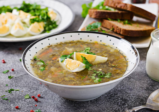 istock Green sorrel soup with eggs. Summer menu. Healthy food. 952393224