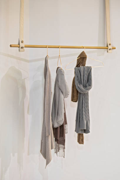 istock Suspended fabric and metal clothes hanger 952393968