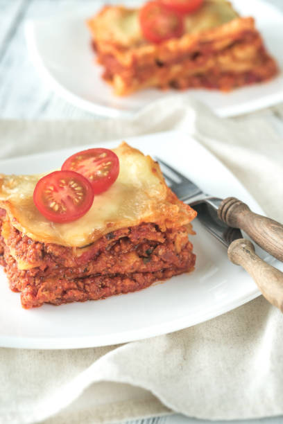 istock Portion of lasagne on the white plate 952394792