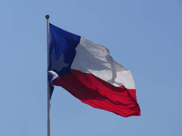 istock Texas flag flying in the air 952399050