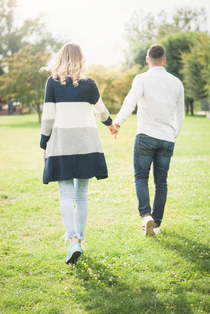 istock Couple holding hands and walk 952401930