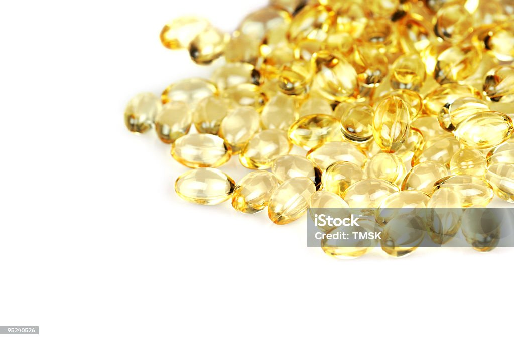 Golden Capsule  Alternative Therapy Stock Photo