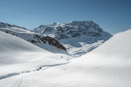 Hikers snowshoeing on mountain