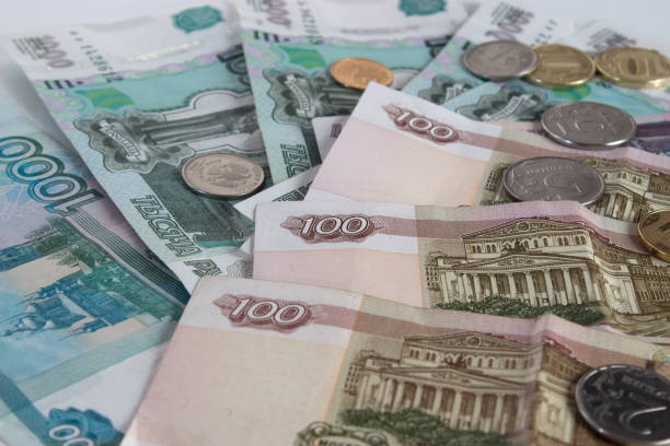 istock Russian money: one thousand rubles, one hundred rubles and coins 952426536