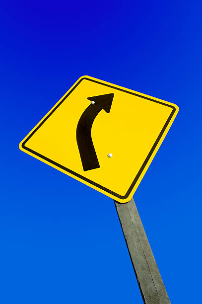 istock road sign against a blue sky with clipping path. 95246291