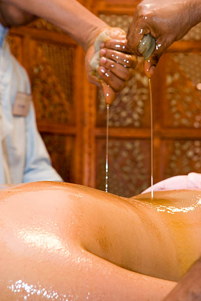 istock indian ayurvedic oil body massage 95246750