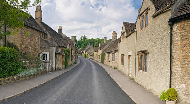 istock Quaint cottages on village street 95247612