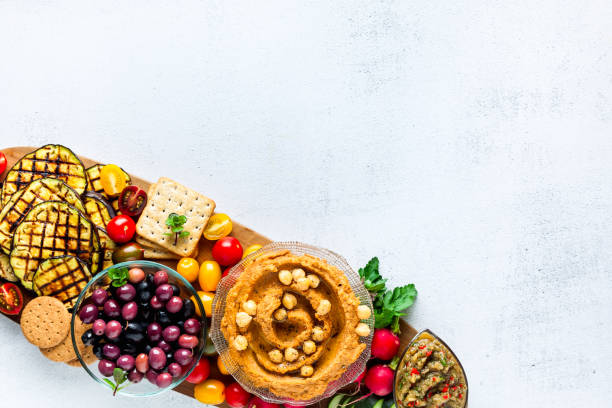 Vegan snack board. Flat-lay of Various Vegetarian dishes  hummus
