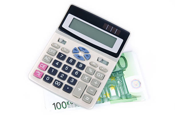 istock hundred euro and calculator 95247889