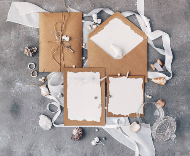 istock Flat lay Workspace Mock Up Wedding invitation cards, craft envelopes.  top view. Templates. 952491330
