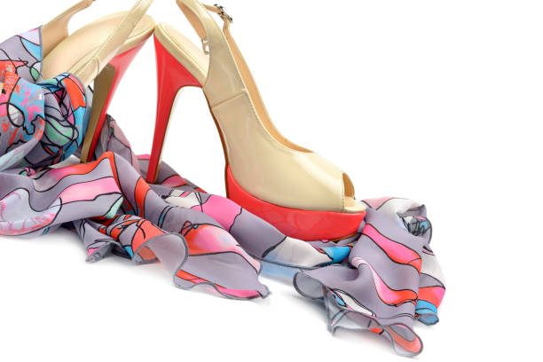 istock Elegant sandals and scarf isolated on white background. 952491964