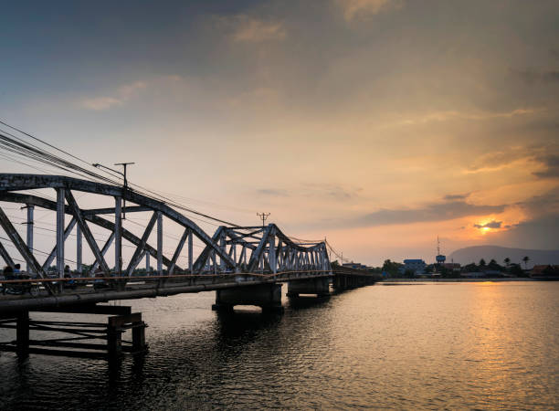 istock landmark old bridge and river at sunset in kampot cambodia 952496842