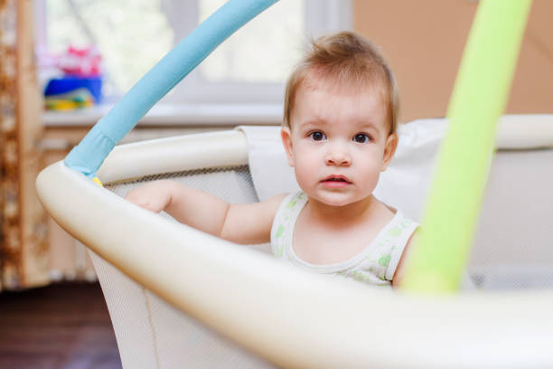 istock A year-old child is sitting in an arena 952499560