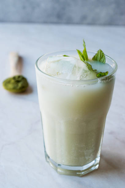 istock Iced Matcha Tea Latte with Mint Leaves / Smoothie. 952506072