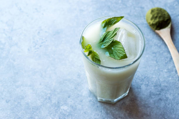istock Iced Matcha Tea Latte with Mint Leaves / Smoothie. 952510582
