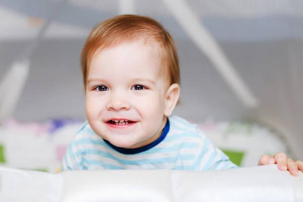 istock A year-old child is sitting in an arena 952531058