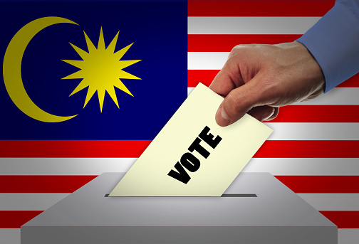 Man voting on elections in MALAYSIA