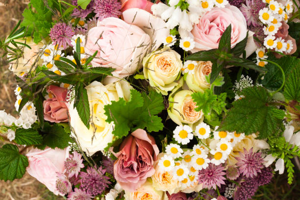 istock Beautiful roses lylies boquet background 952538452