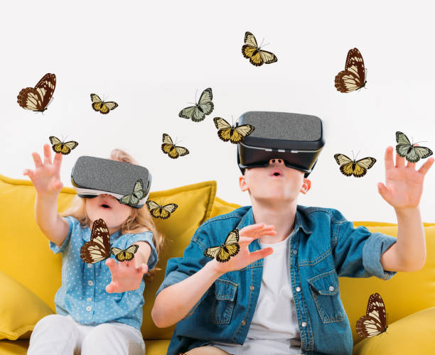 istock excited siblings using virtual reality headset and looking at butterflies 952545114