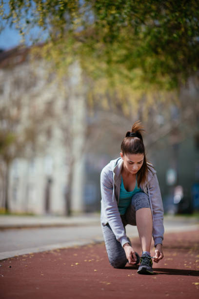 istock Beautiful young woman on running 952546490