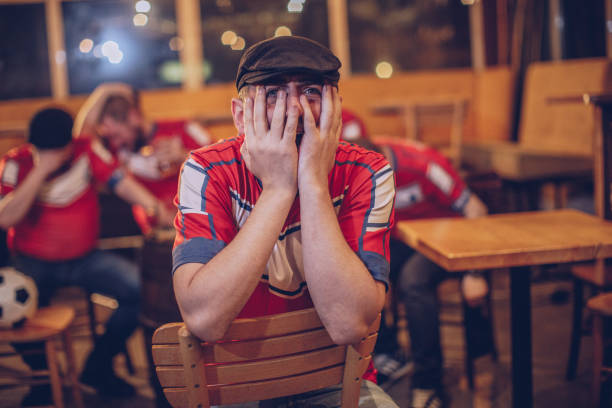 istock Annoyed soccer fans 952556132