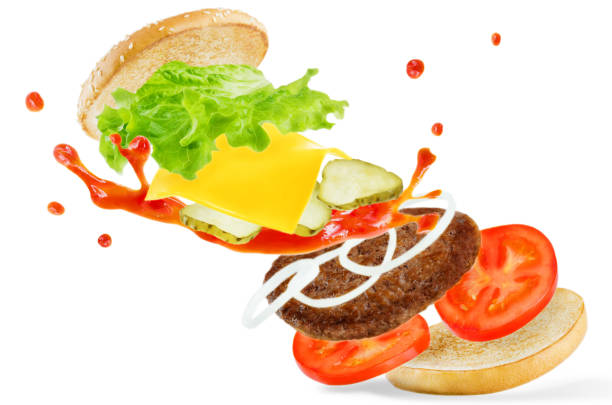 istock Flying meat Burger with ketchup splat 952556820