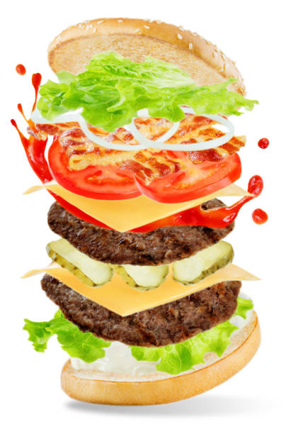 istock Flying meat Burger with mayonnaise and ketchup splat 952556822